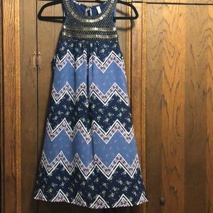 Summer dress with beading around the neckline